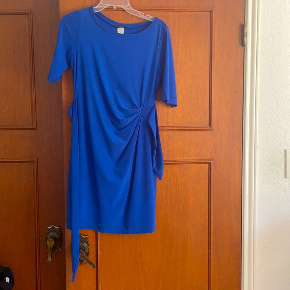 Beautiful blue polyester dress fitted to body